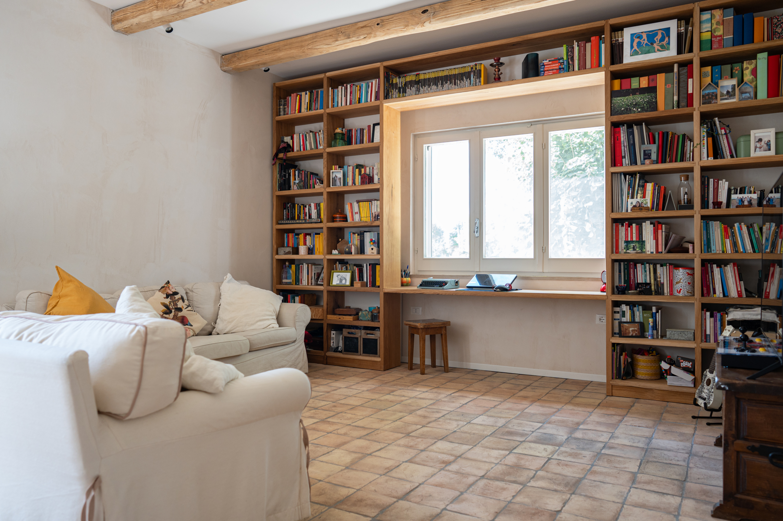 wooden bookcase and window