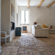 living room with window and sofas